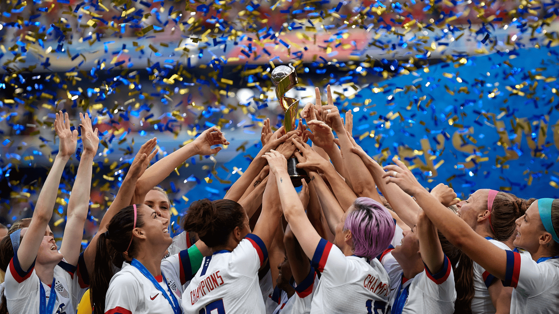 Women's football team winning a cup